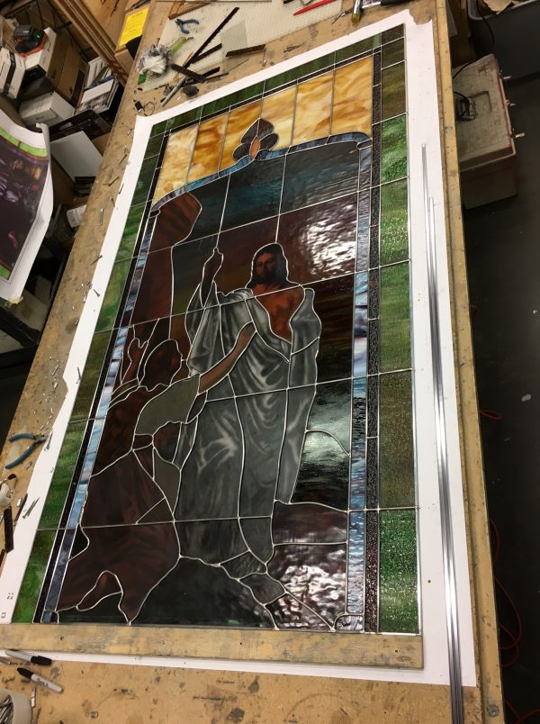 The stained glass is rebuilt using all new lead